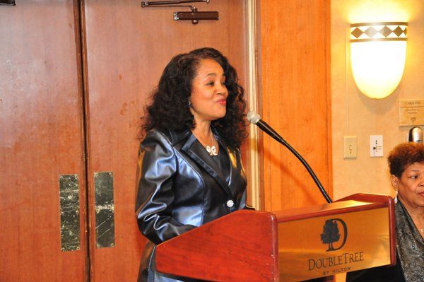 speaking curly woman