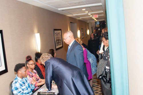 writing in attendance sheet