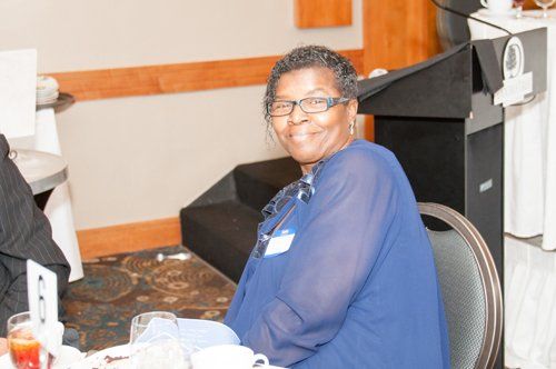 old woman in blue dress