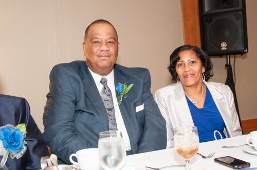 man and woman smiling