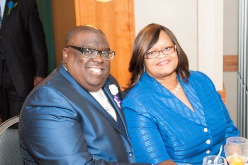 man and woman smiling