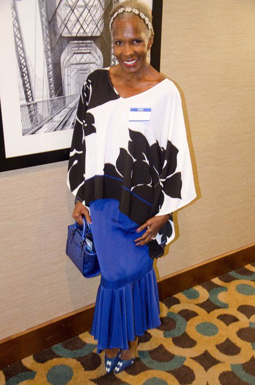 woman in white and blue dress