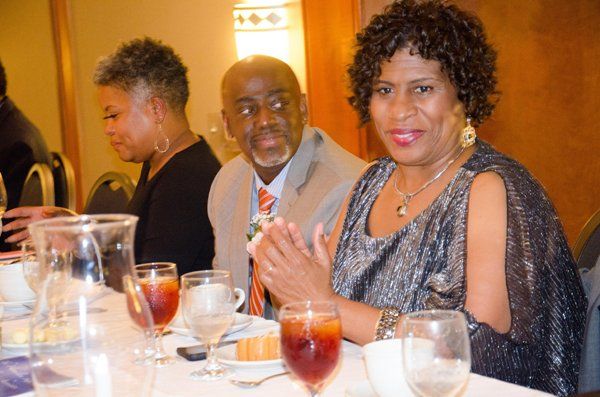 group of standing eating