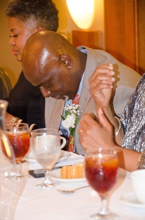 group of standing eating