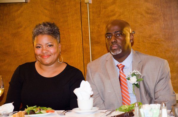 man and woman sitting next to each other