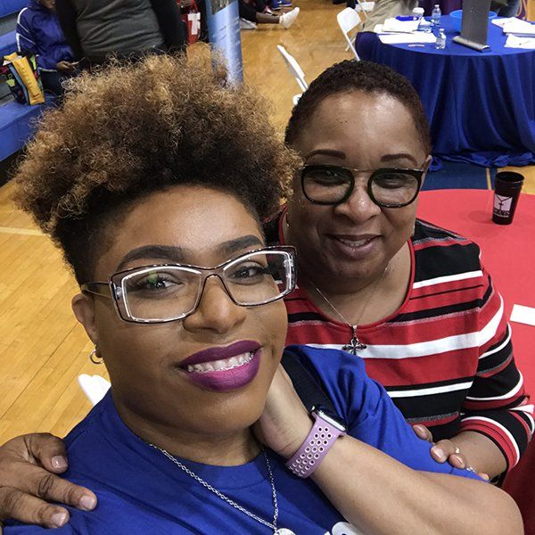 semi afro girl with another girl