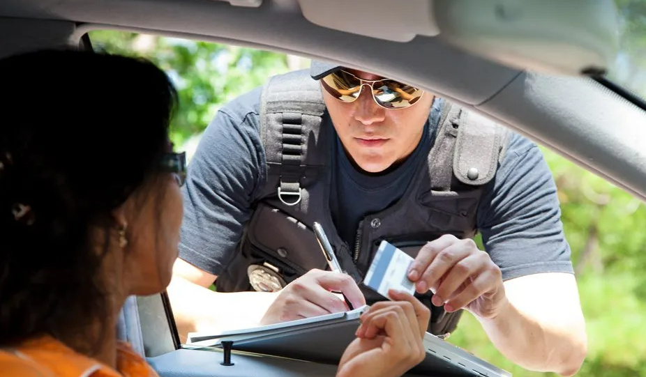 Policeman Giving Ticket To Traffic Violator — Aylett, VA — Palmer Law Firm