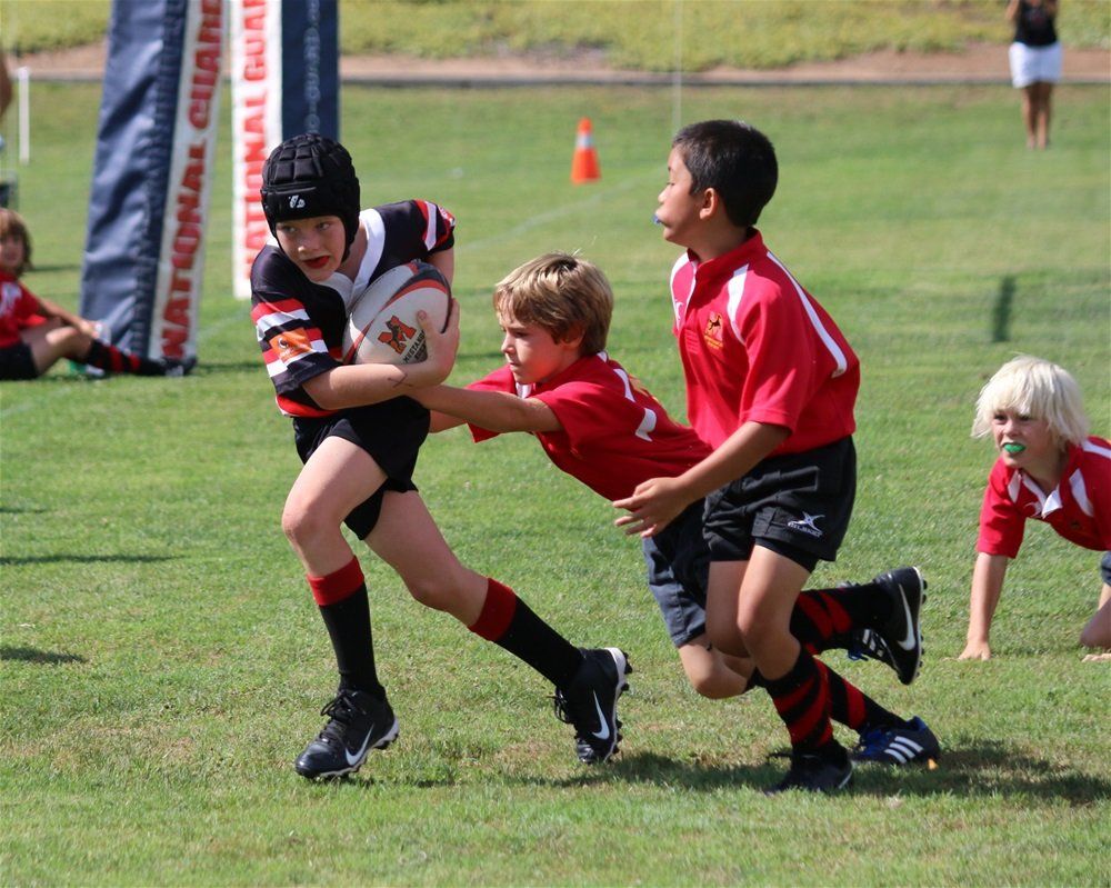 boys playing rugby