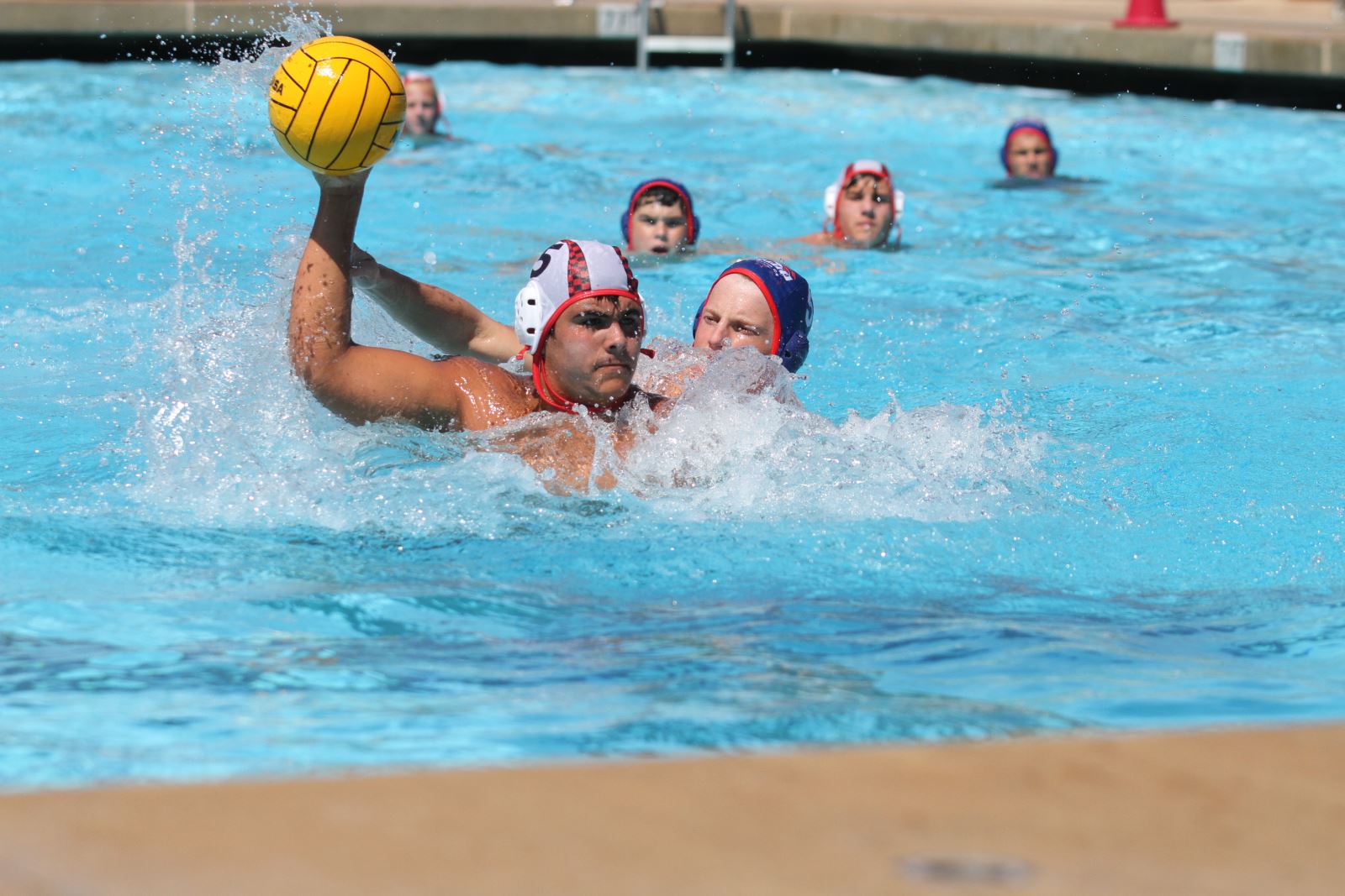 boys in a water polo match