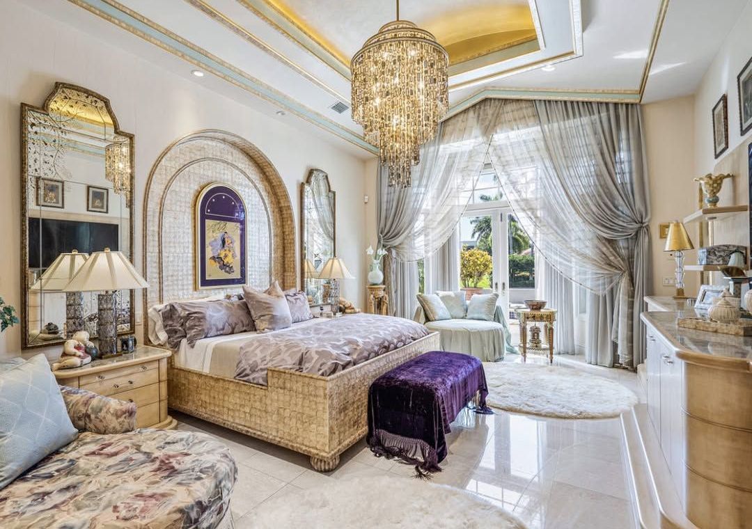 There is a large bed in the middle of the room.