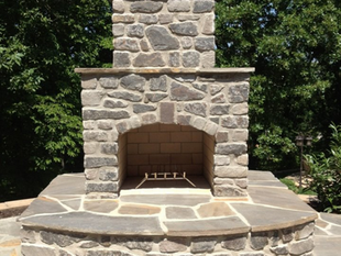 stonework outdoor fireplace