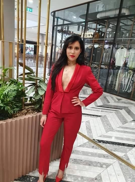 Beautiful Woman Wearing Red Clothes — Dressmaker & Salon in Belconnen, ACT