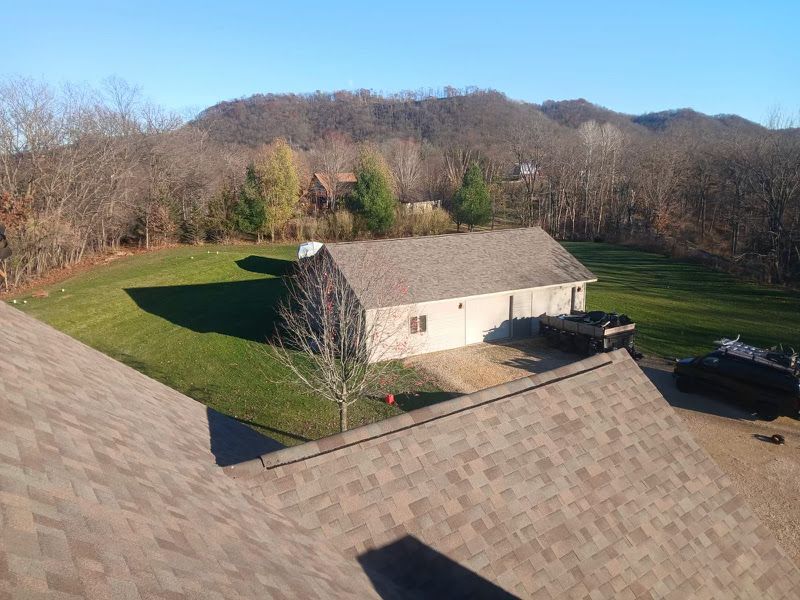 new house roof and garage roof installed by Curti Construction in DeSoto, WI