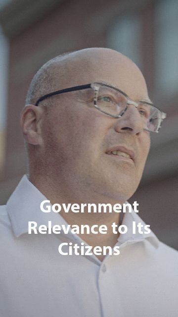 Image of Kelly discussing Government Relevance to its Citizens