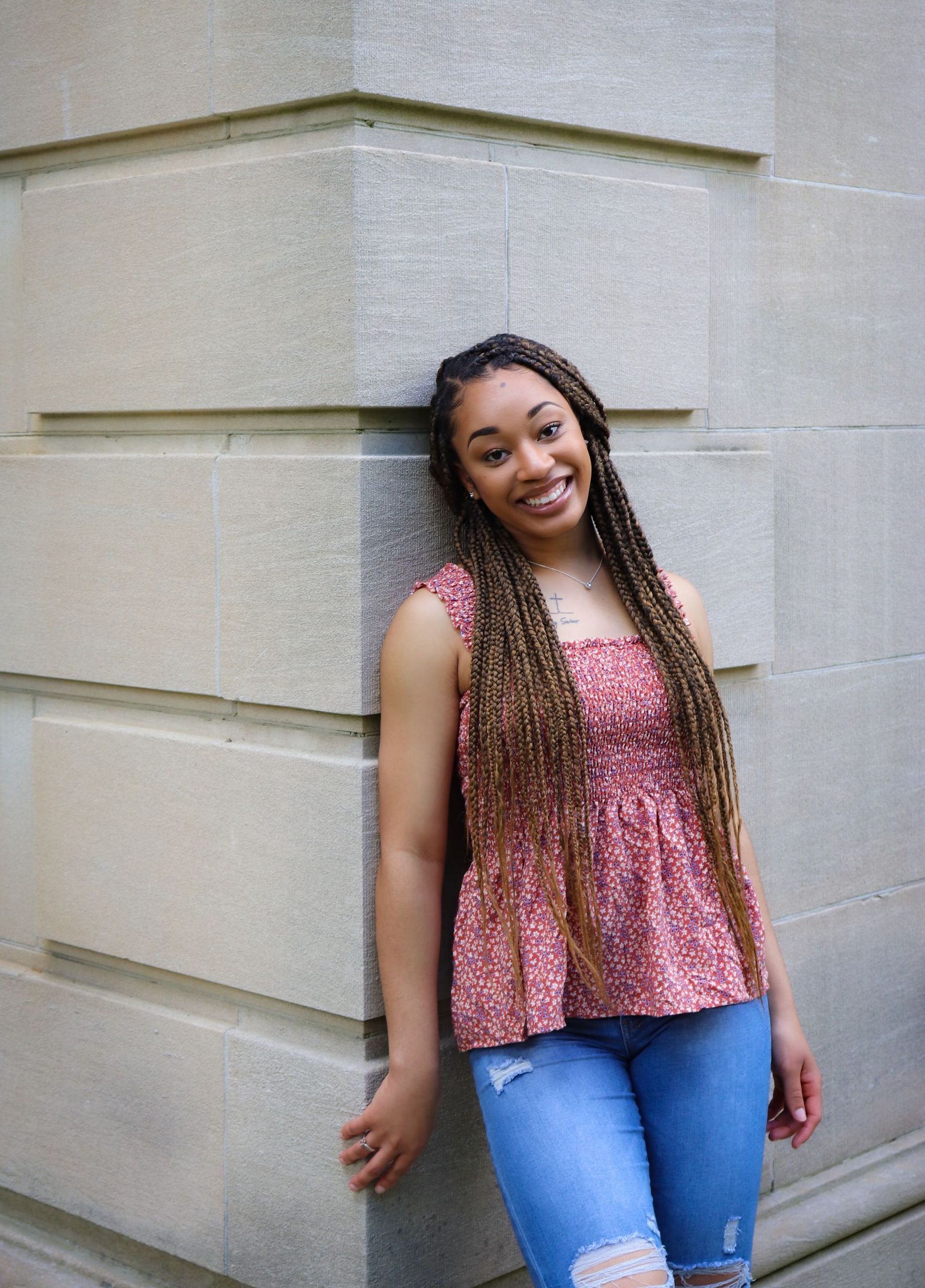Shauna in front of building.