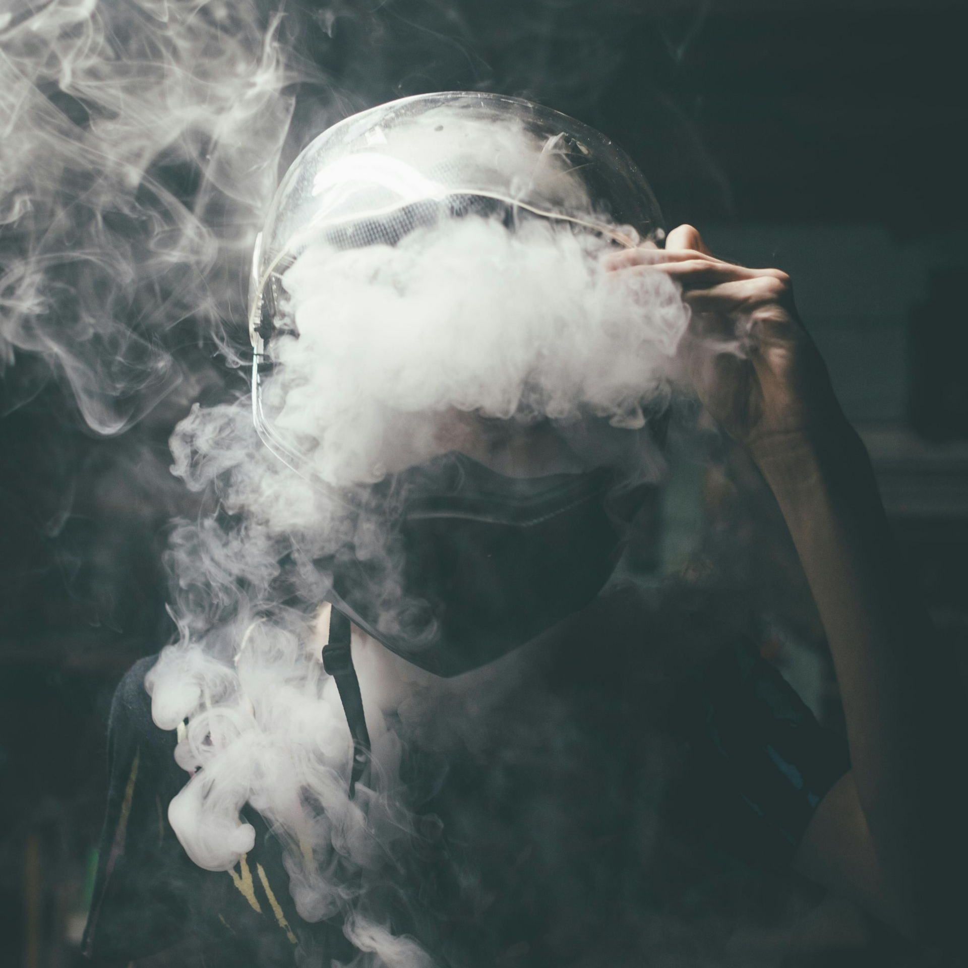 Graphic showing smoke particles lingering in walls and furniture after a fire