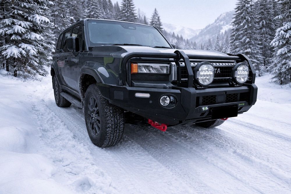 Black 4x4 Vehicle in The Snow