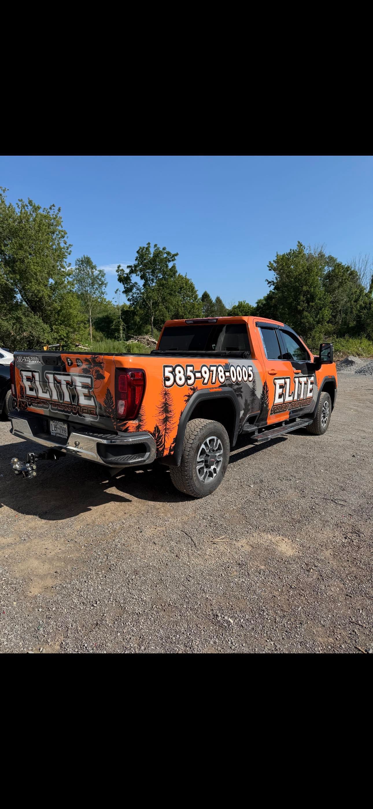 An orange pickup truck with 