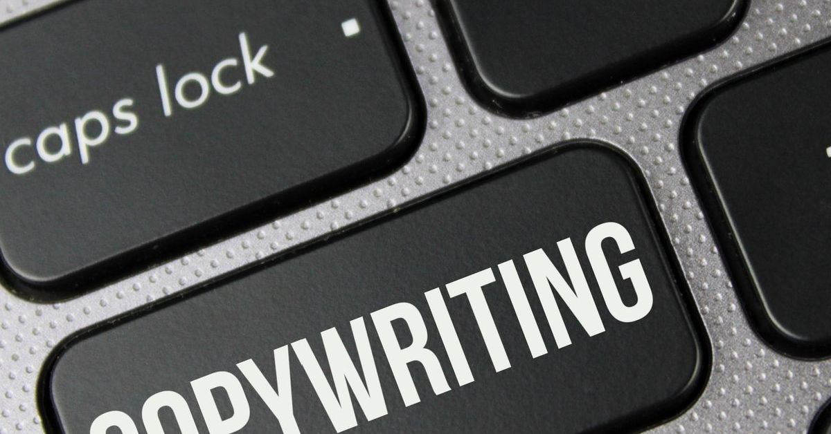 A close up of a keyboard with the word copywriting on it