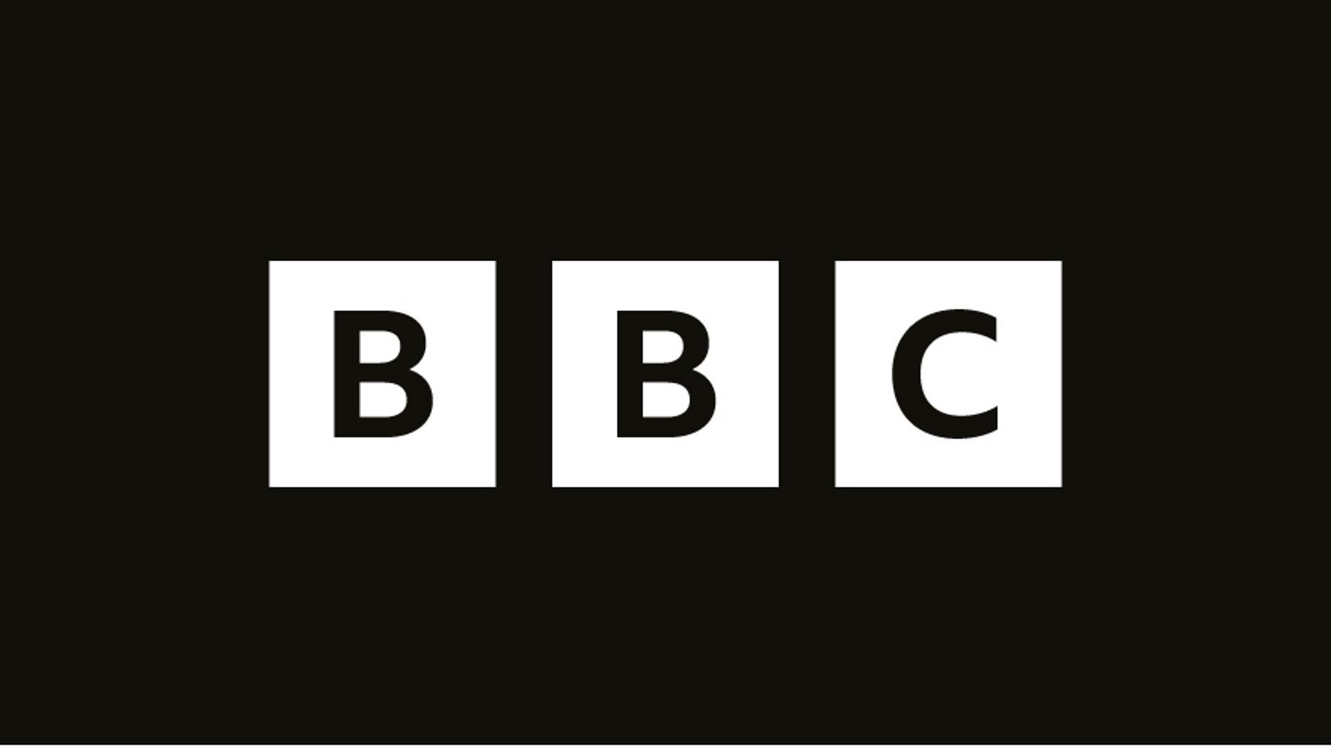 BBC logo: three white squares with the letters 