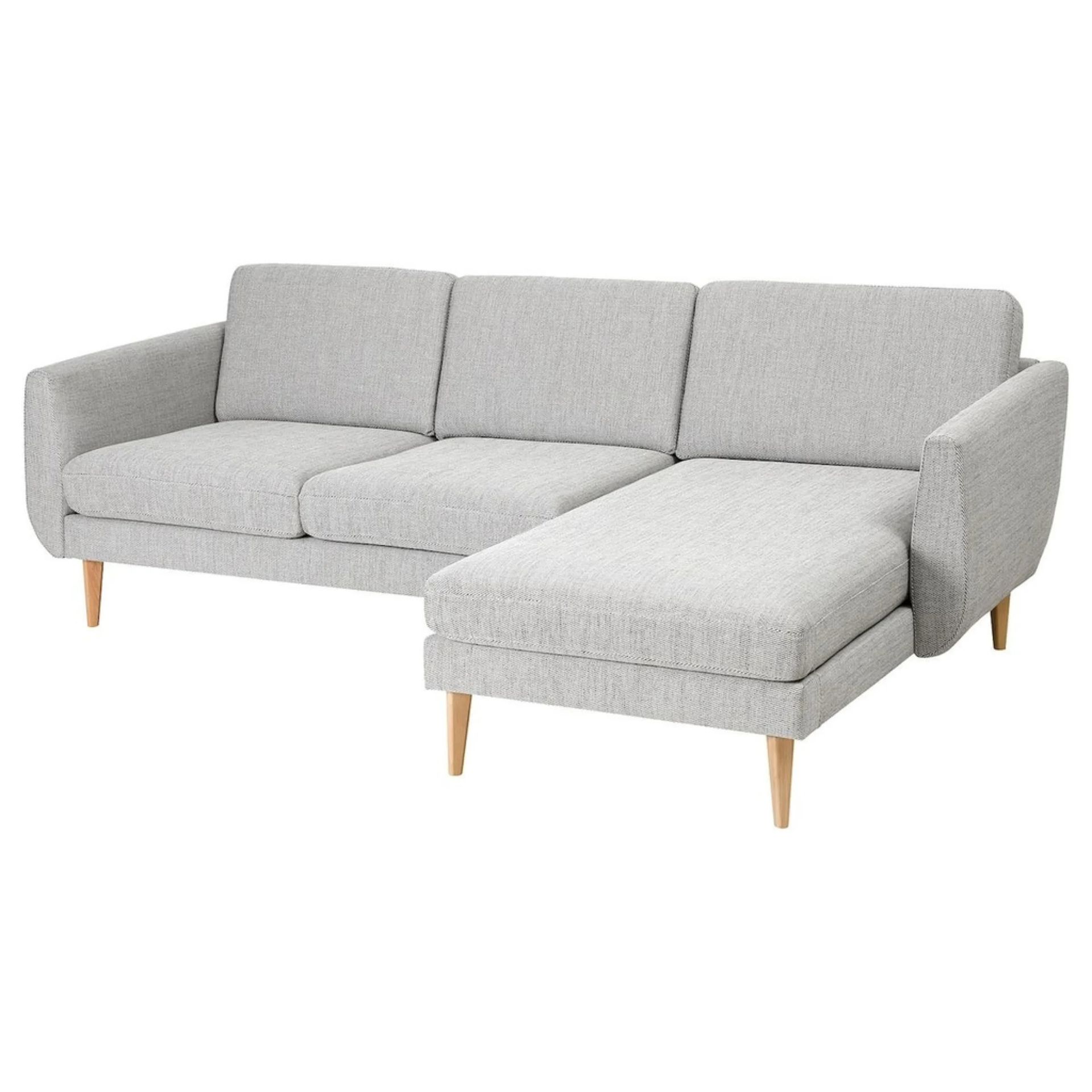 Light gray sectional sofa with wooden legs.