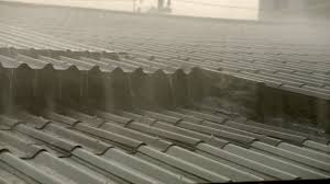 metal roof in the rain rainstorm 