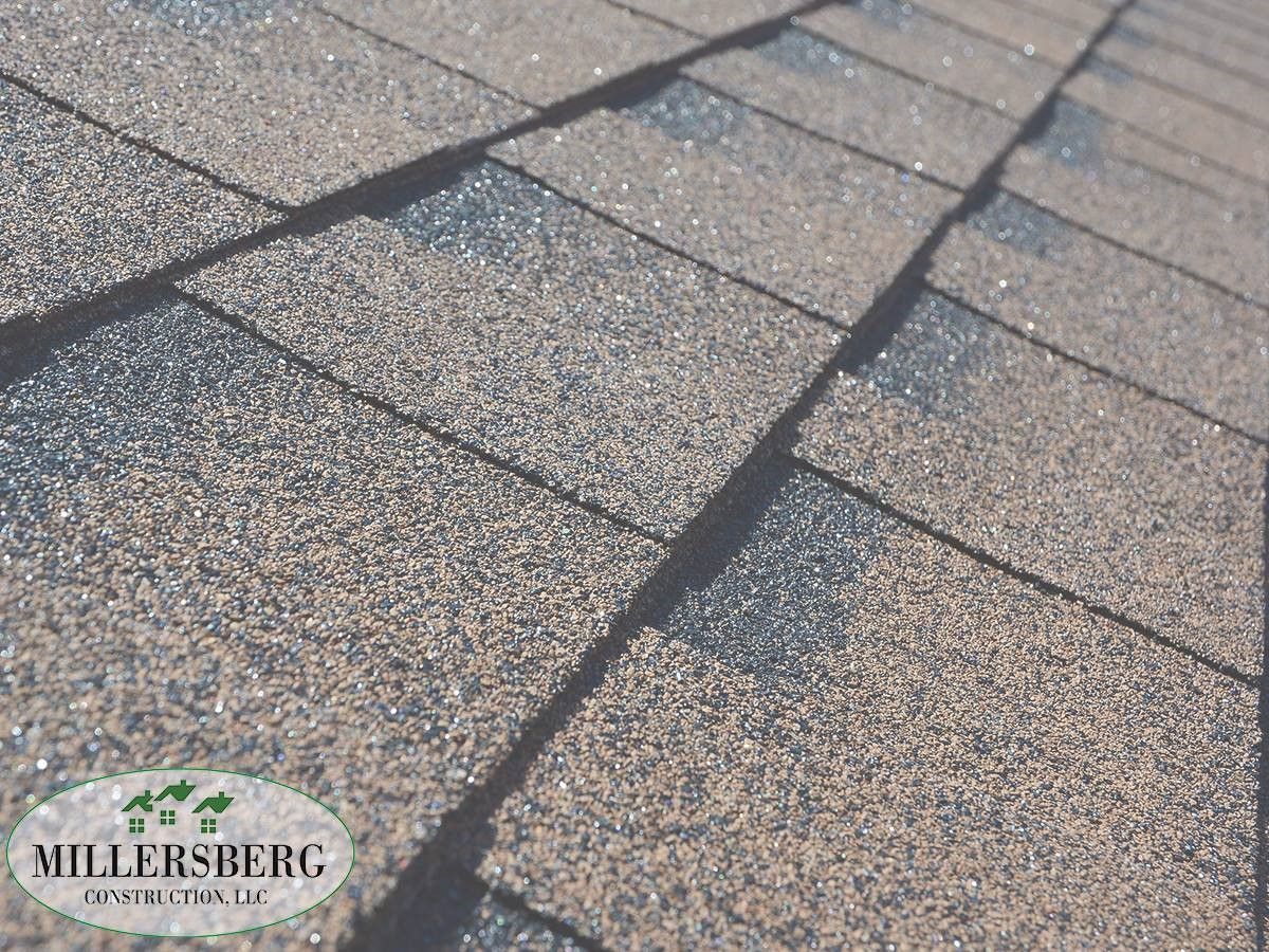Close-up of brown asphalt roof shingles.