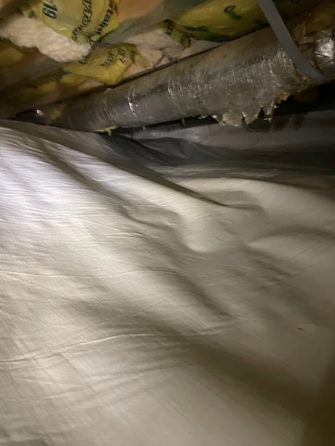 A close up of a piece of plastic in a room.