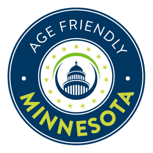 A blue circle with the icon of a hand with a green heart in the center. The words Age-Friendly Minnesota encircle the icon