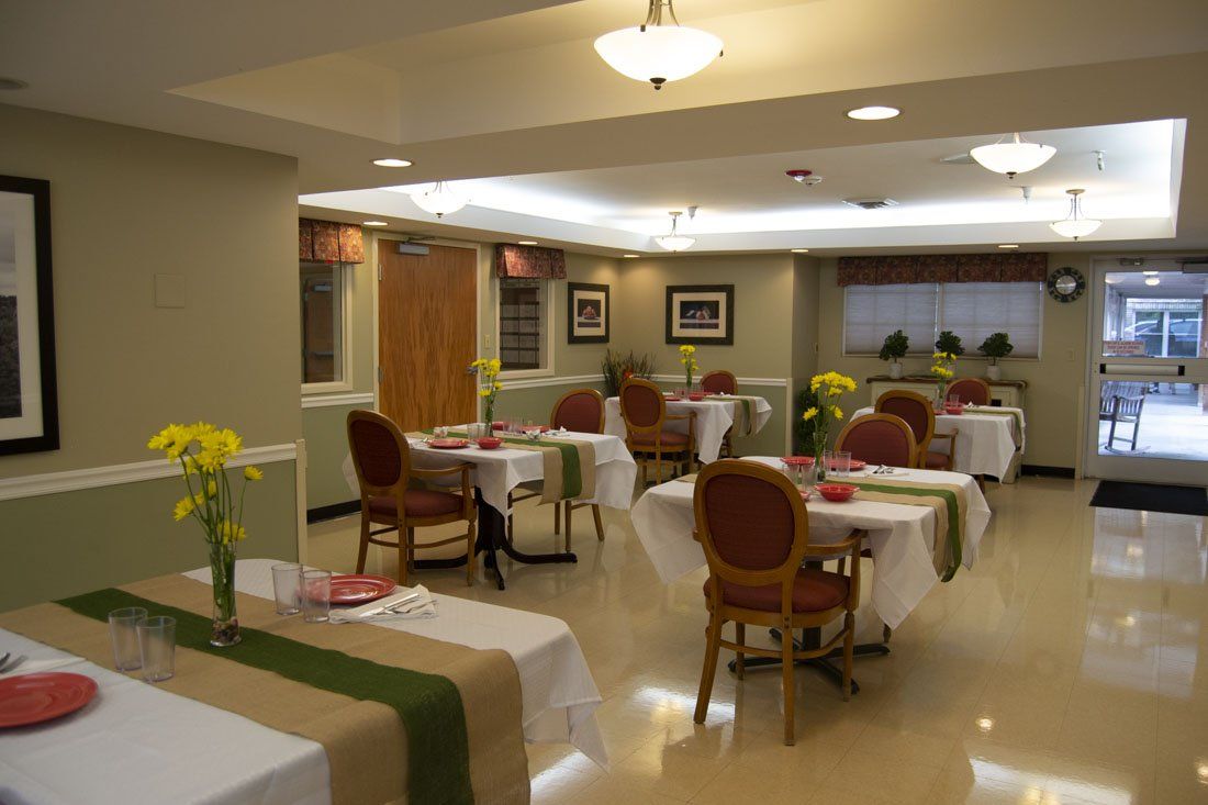 A large dining room filled with tables and chairs