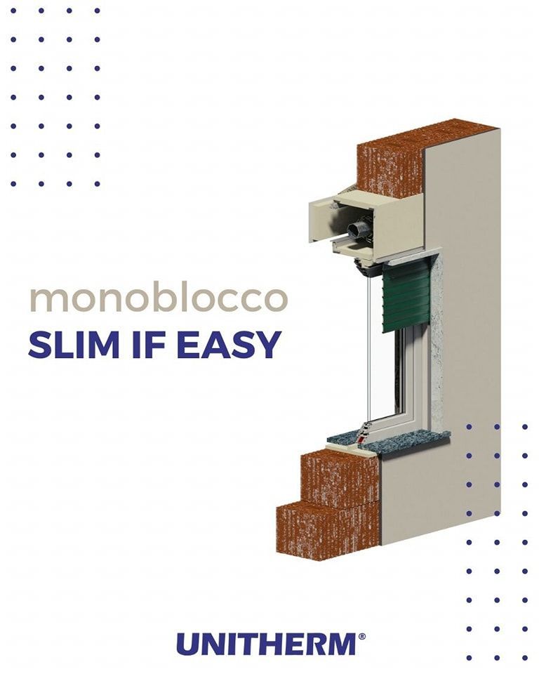 Una foto di una finestra con una tenda avvolgibile.