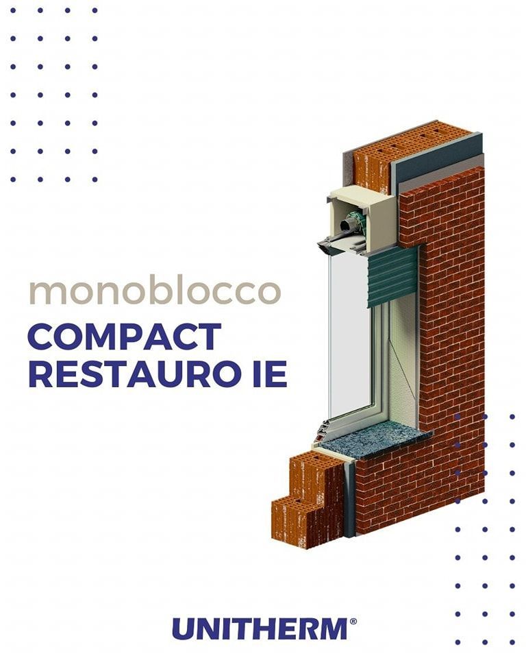 Un'immagine di un muro di mattoni con una finestra.