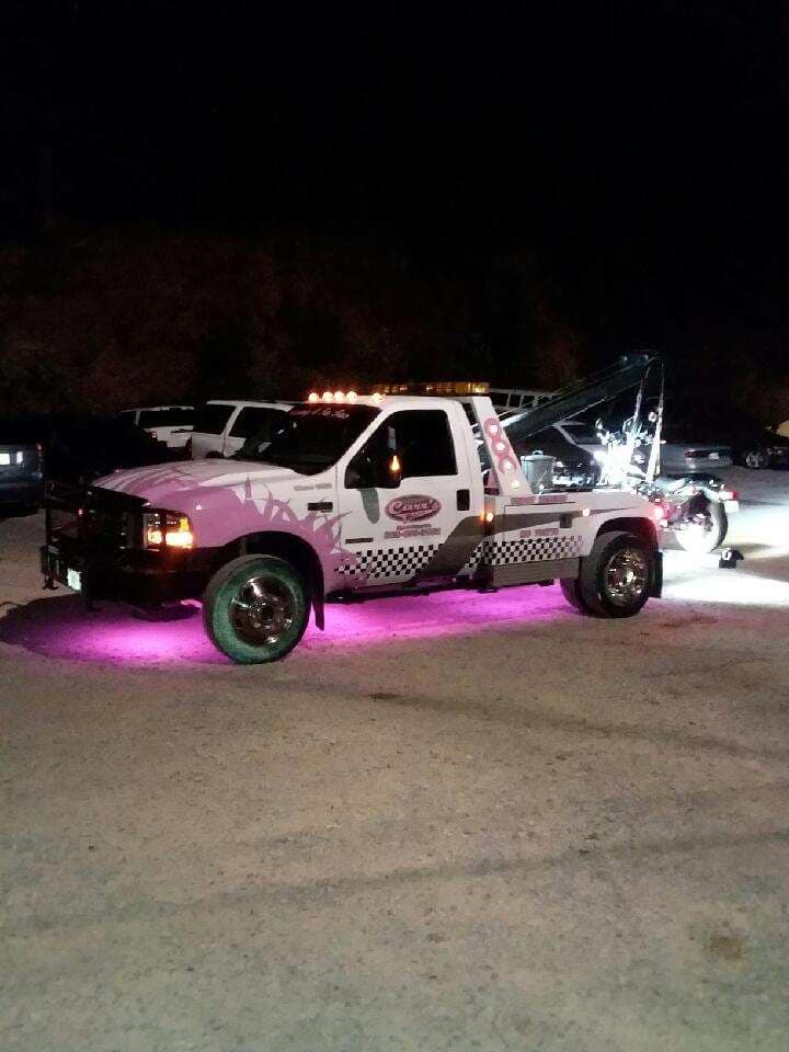 Tow truck towing a motorcycle — Pigeon Forge, TN — Carr's Auto Service