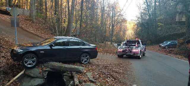 Black car on the side of the road — Pigeon Forge, TN — Carr's Auto Service