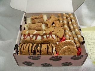 A box filled with a variety of dog treats.