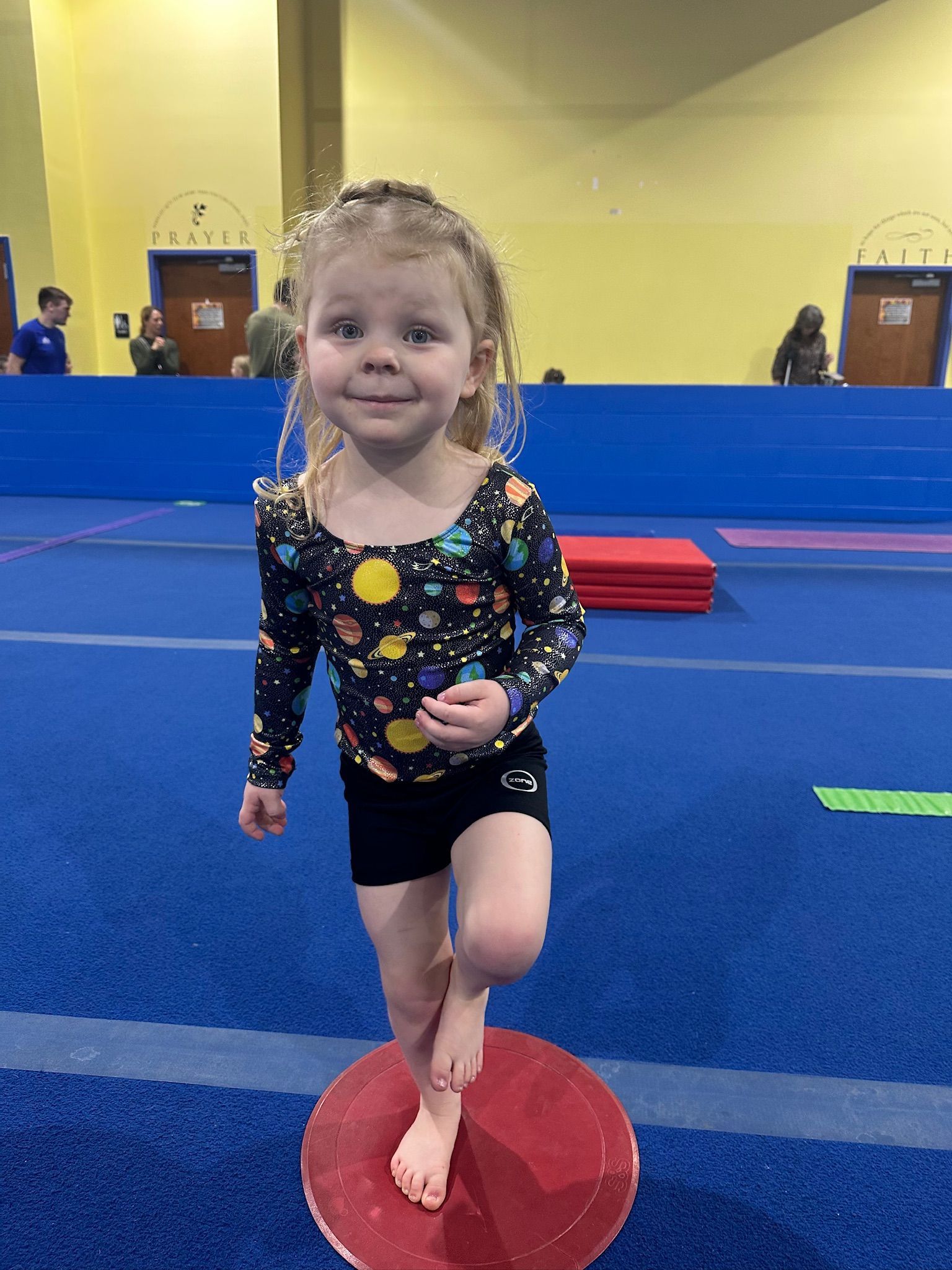 little girl in a gym