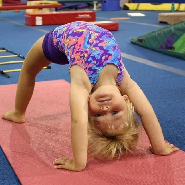 little girl in a gym