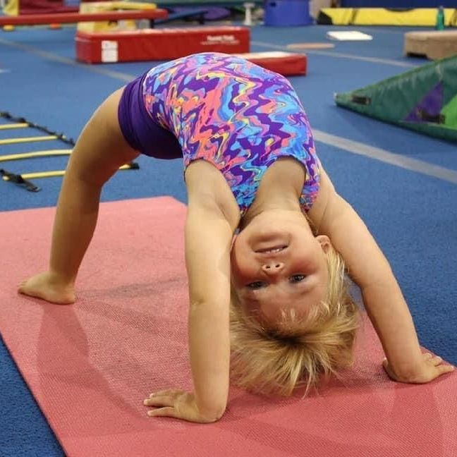 little girl in a gym