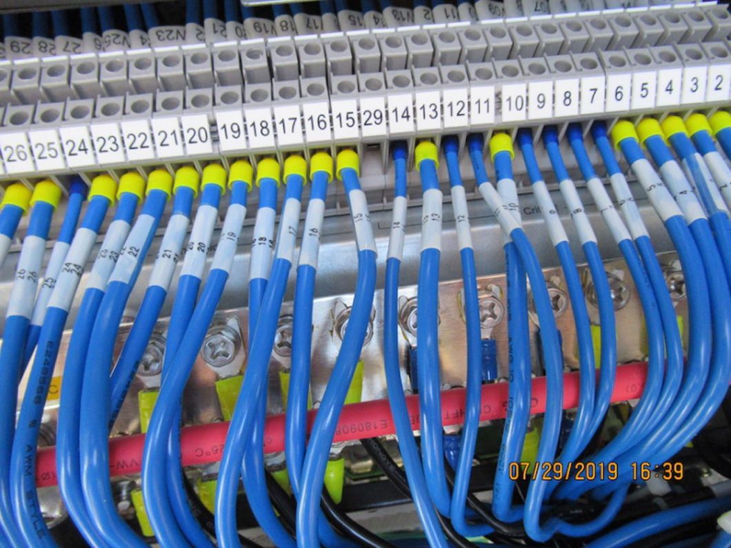 A bunch of blue wires with numbers on them