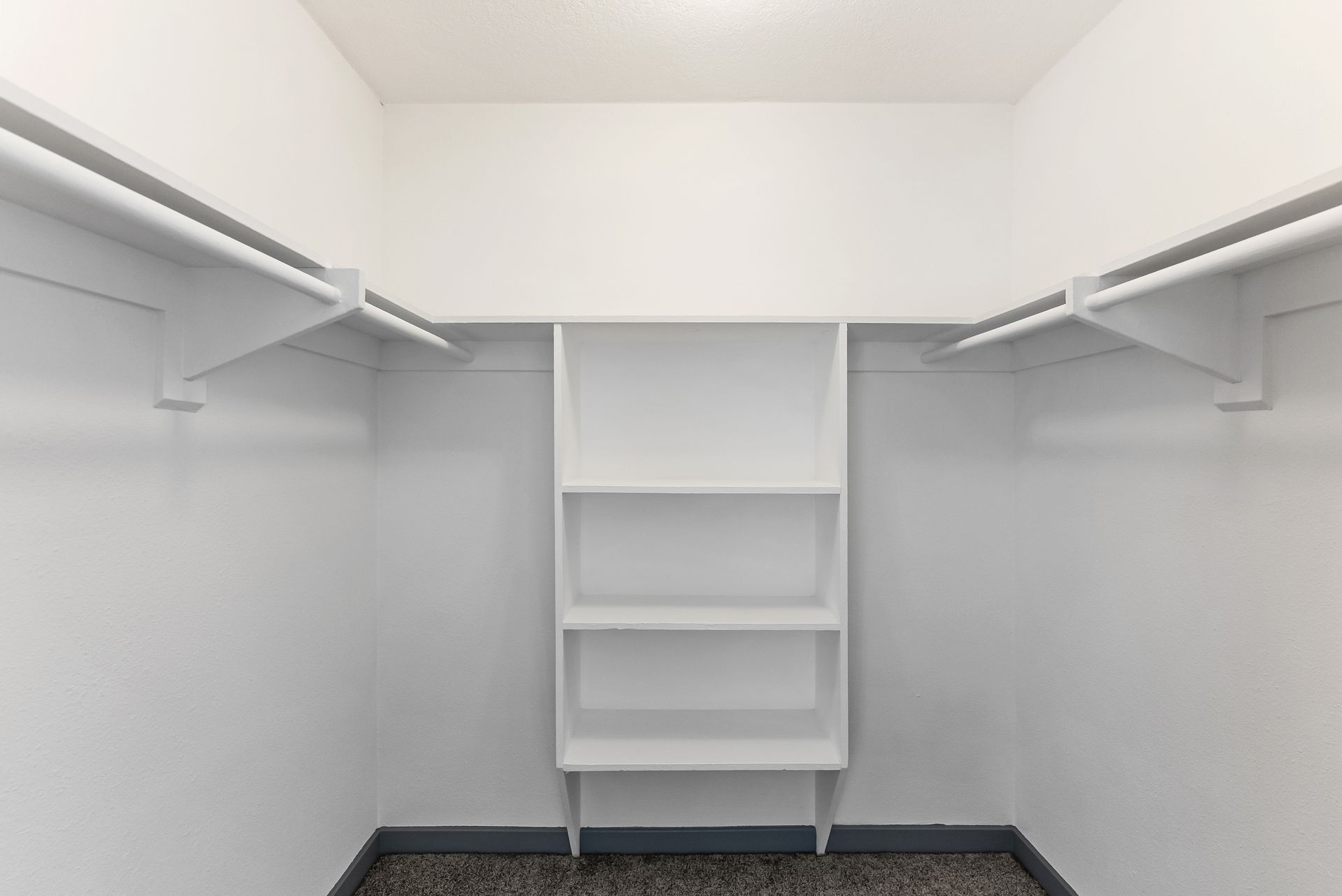 Sliding Photo Gallery Displaying Apartment Features- Walk-in closet with three shelves