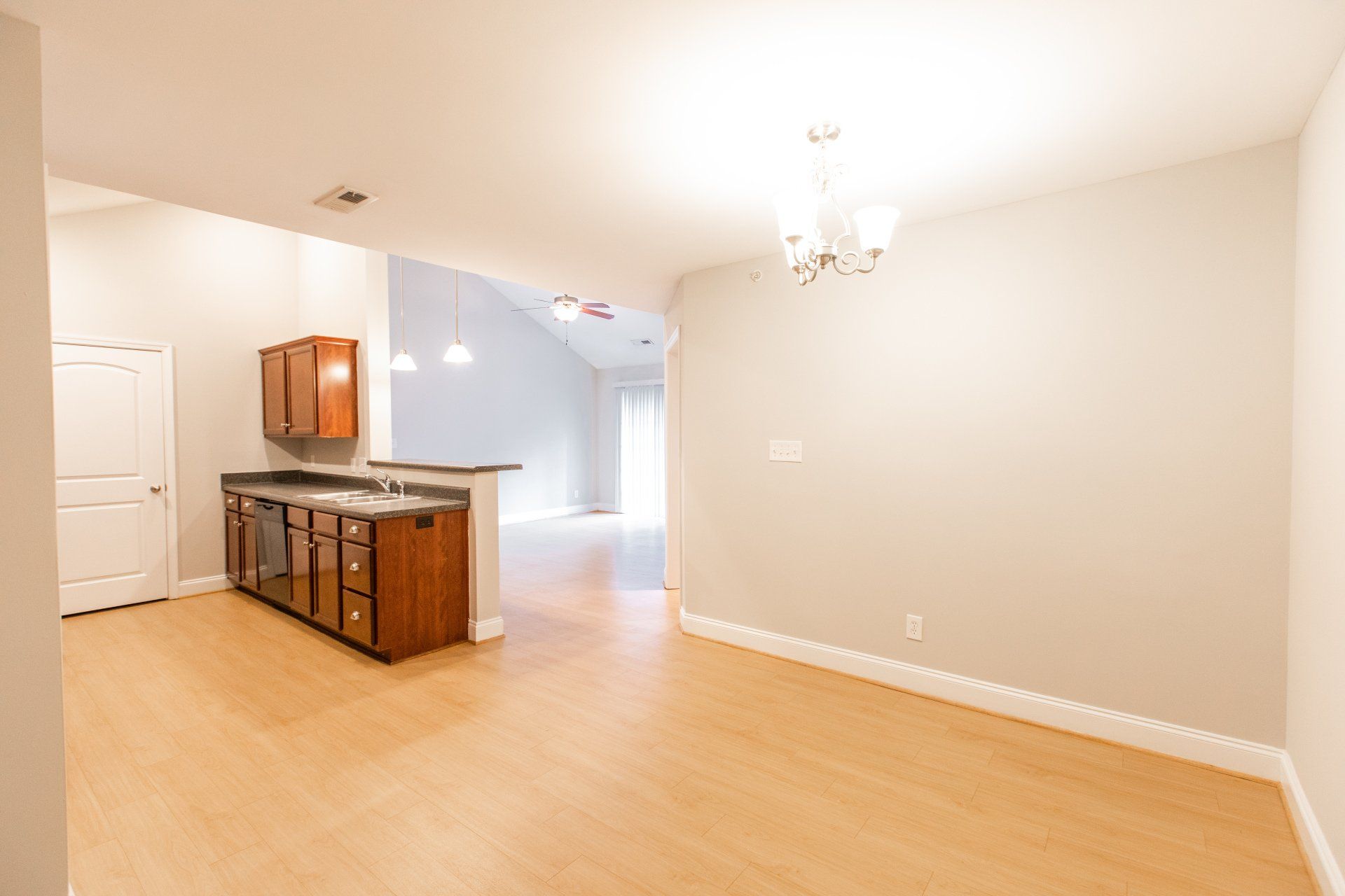 Living room with view of kitchen