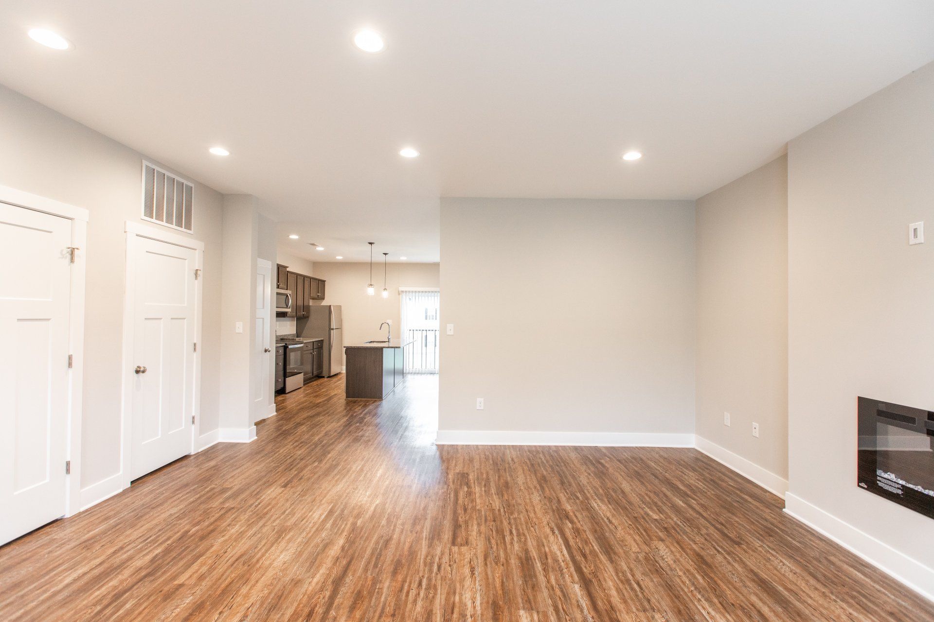 Living room with view of kitchen