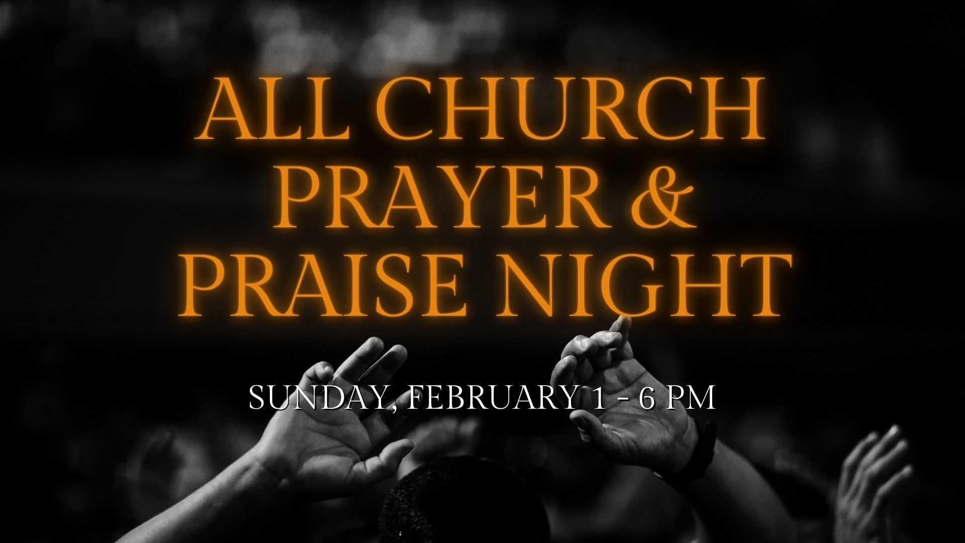 Hand holding glowing string lights against a colorful sunset.