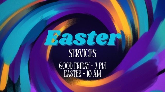 Hand holding glowing string lights against a colorful sunset.