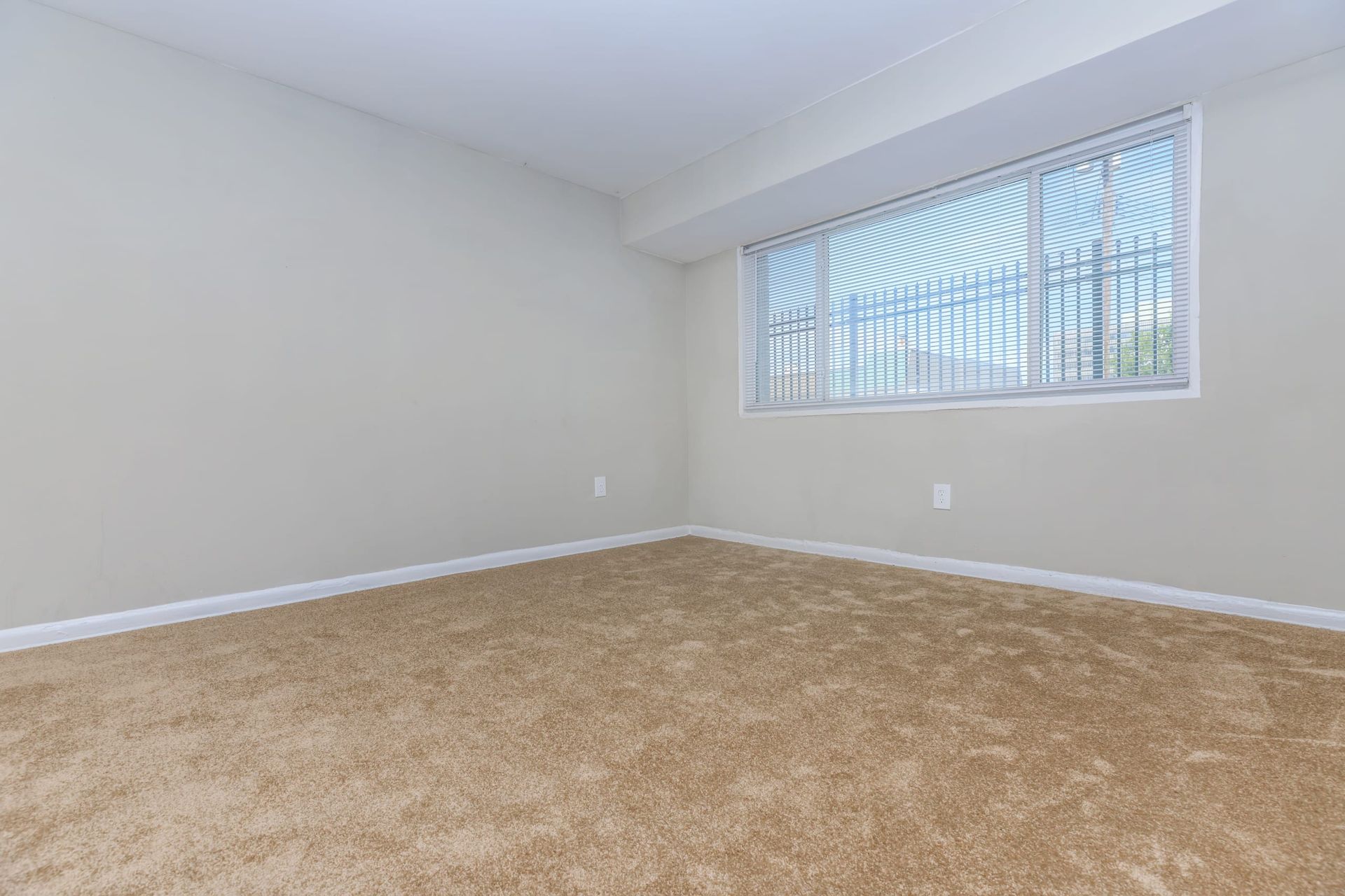 There is a large window in the middle of the room.