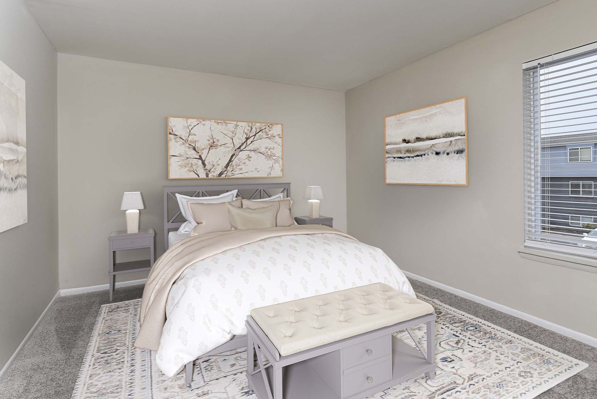 Bedroom in a modern apartment with a gray bed, two nightstands, lamps, and a window with blinds.