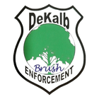 DeKalb Brush Enforcement logo: white shield with black outline, green tree, blue text on white.