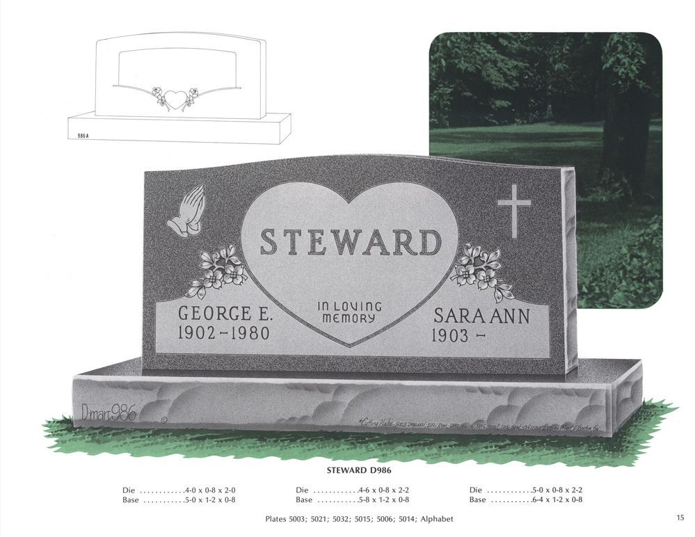 An example of a grey granite double upright monument headstone. A large heart is carved in the center and two religious symbols are also carved on both sides. Various numbers are below, but are for the companies reference use only.