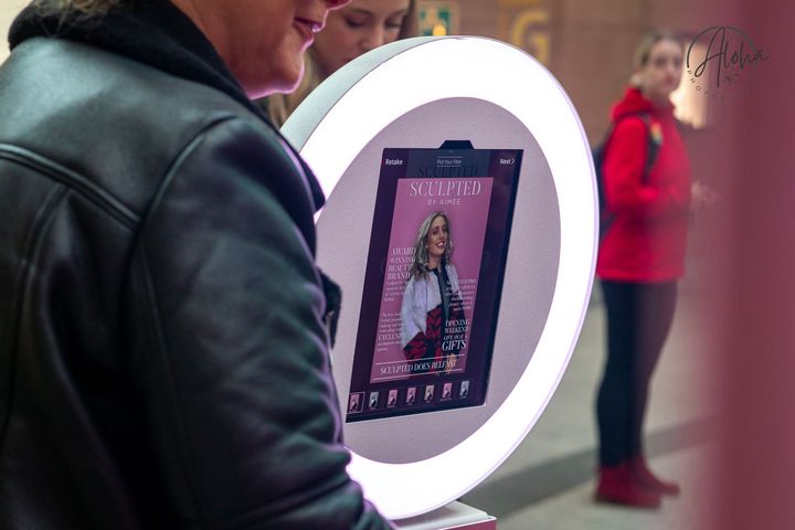 two girls using a digital selfie photo booth in Charlotte NC