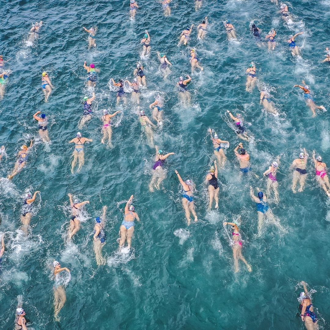aerial photo taken with a drone of swimmers in the ocean